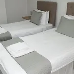 Cocoon @ International Inn + Apartments